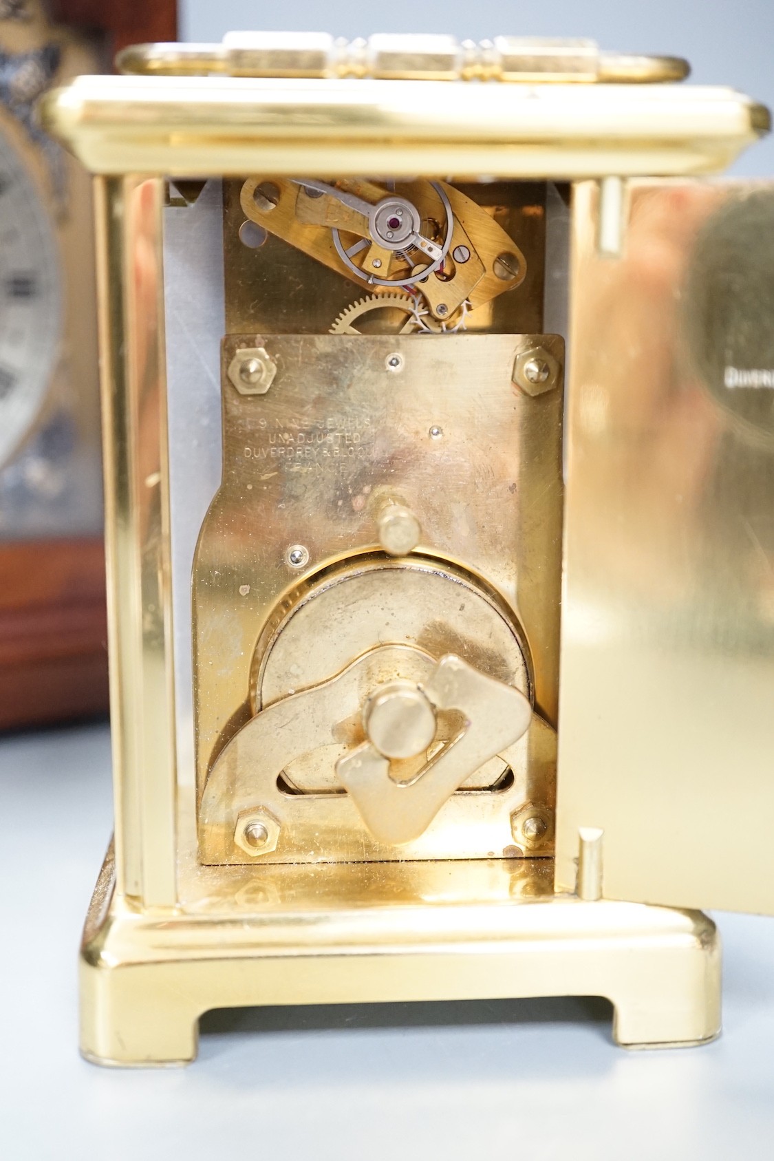 A burr walnut Elliott clock and a Duverdrey & Bloquel carriage timepiece (2)